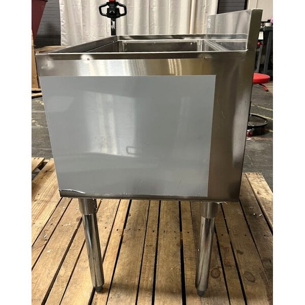 Scratch and Dent Regency 18" x 30" Stainless Steel Underbar Ice Bin with Bottle Holders - 98 lb.