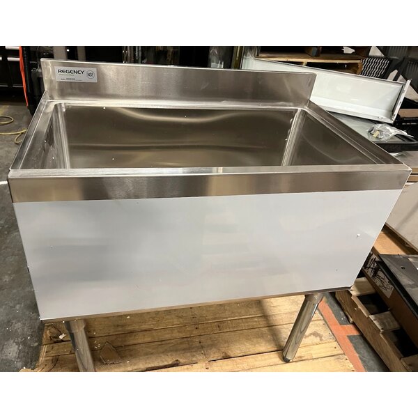 Scratch and Dent Regency 18" x 30" Stainless Steel Underbar Ice Bin with Bottle Holders - 98 lb.