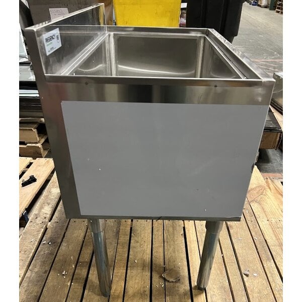 Scratch and Dent Regency 18" x 30" Stainless Steel Underbar Ice Bin with Bottle Holders - 98 lb.