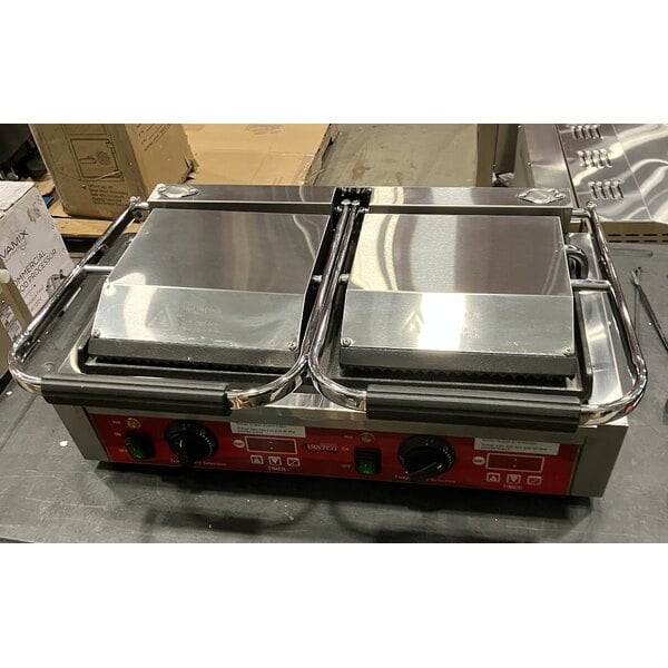 Scratch and Dent Avantco PG400GST Commercial Dual Panini Sandwich Grill with Timer, Grooved Top and Smooth Bottom Plates, and 19 5/8" x 9 1/8" Cooking Surface - 120V, 3500W