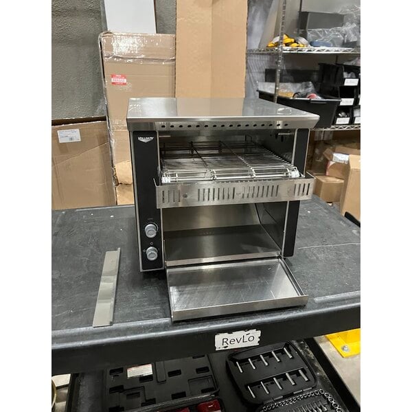 Scratch and Dent Vollrath CT2H-120250 JT1H Conveyor Toaster with 2 1/2" Opening - 120V, 1600W