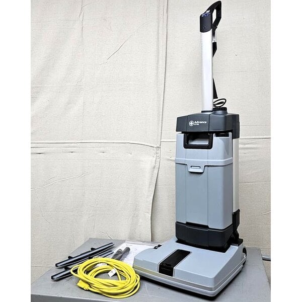 Scratch and Dent Advance SC100 107408120 12 1/4" Corded Upright Walk Behind Floor Scrubber - 1 Gallon