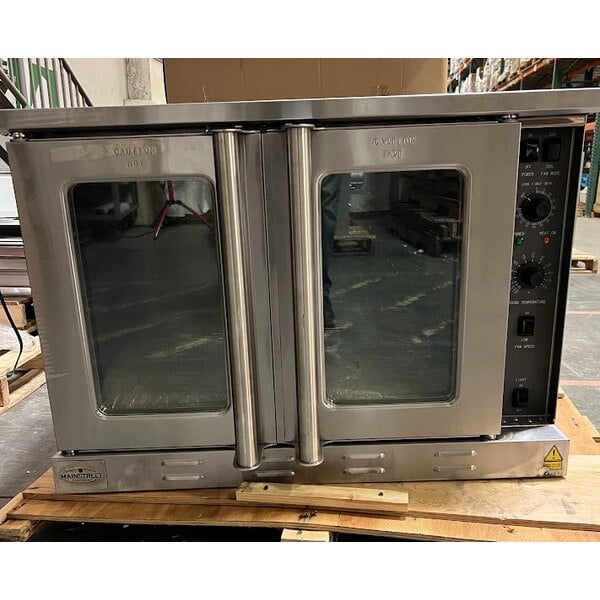Scratch and Dent MainStreet Equipment EC1-C Single Deck Electric Full Size Convection Oven with Legs - 208V, 3 / 1 Phase, 11 kW