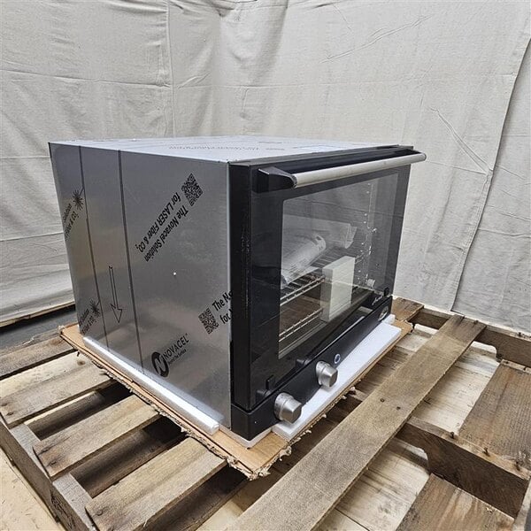 Scratch and Dent Cadco Anna OV-023 4-Shelf Half Size Medium-Duty Manual Countertop Convection Oven - 208-240V