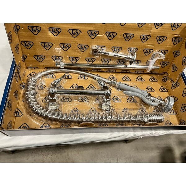 Scratch and Dent T&S B-0133-B EasyInstall Wall Mounted 33 1/4" High Pre-Rinse Faucet with Adjustable 8" Centers, 44" Hose, and 6" Wall Bracket