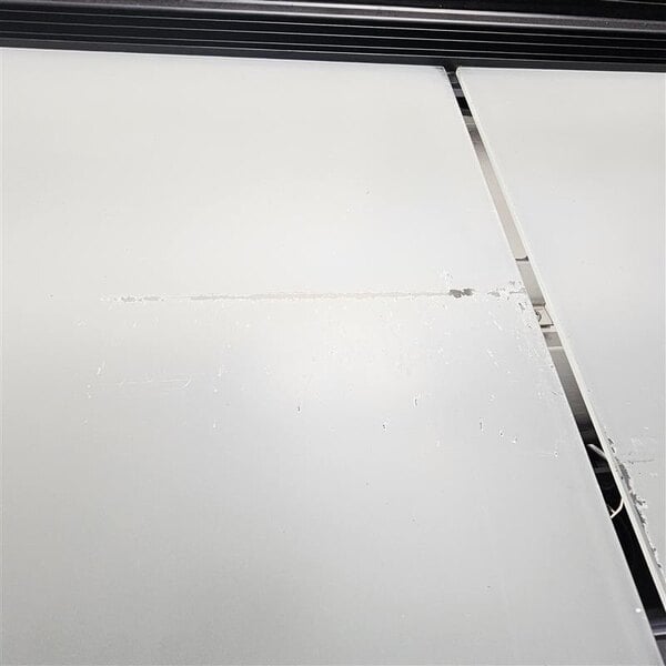 Scratch and Dent Avantco BC-48-HC 48" Curved Glass Black Refrigerated Bakery Display Case