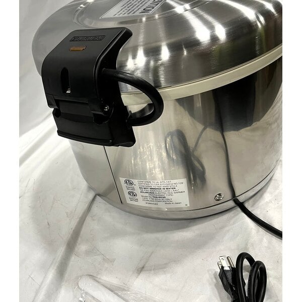 Scratch and Dent Zojirushi THA-603SA 66 Cup (Cooked) Stainless Steel Electric Rice Warmer with Removable Pot - 120V, 77W