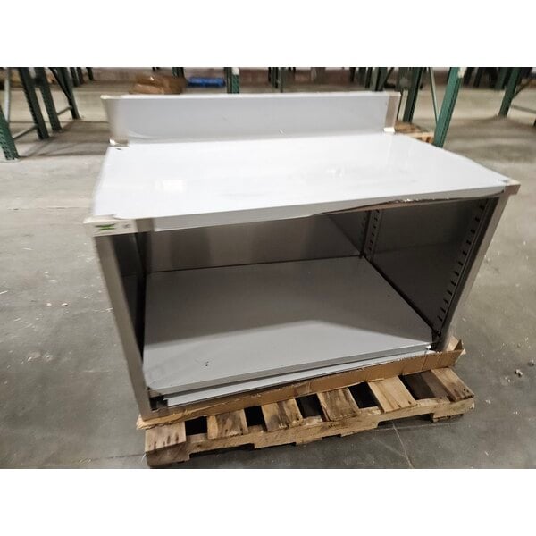 Scratch and Dent Regency 30" x 48" 16 Gauge Type 304 Stainless Steel Enclosed Base Open Front Table with Adjustable Midshelf and 6" Backsplash