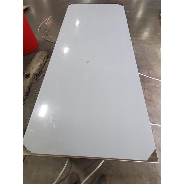 Scratch and Dent Regency 30" x 72" 16 Gauge Type 304 Stainless Steel Enclosed Base Table with Open Front and Adjustable Midshelf