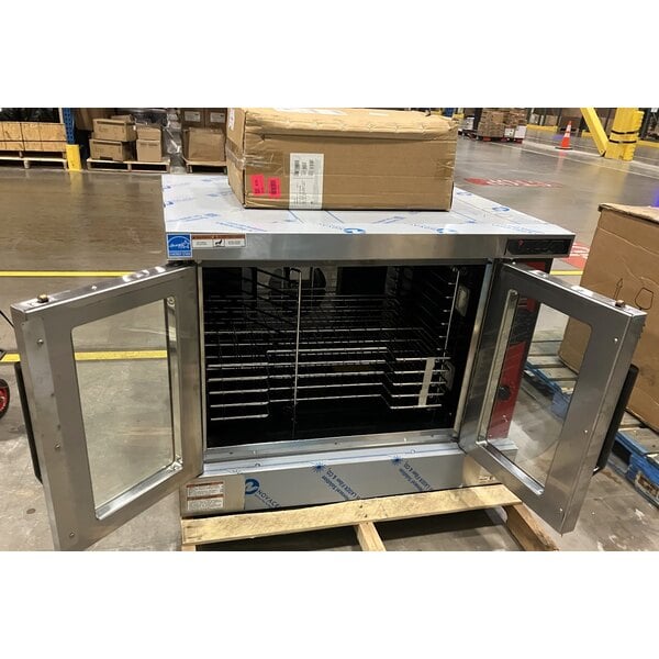 Scratch and Dent Vulcan VC4GD-1 1D150K Natural Gas Single Deck Full Size Gas Convection Oven with Solid State Controls and Legs - 50,000 BTU