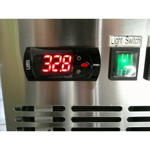 Scratch and Dent Avantco UBB-378-HC-S 79" Stainless Steel Counter Height Solid Door Back Bar Refrigerator with LED Lighting