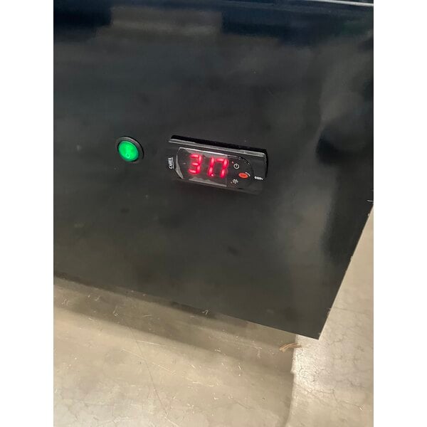 Scratch and Dent MainStreet Equipment GMC-49 52 3/4" Black Swing Glass Door Merchandiser Refrigerator - 120V