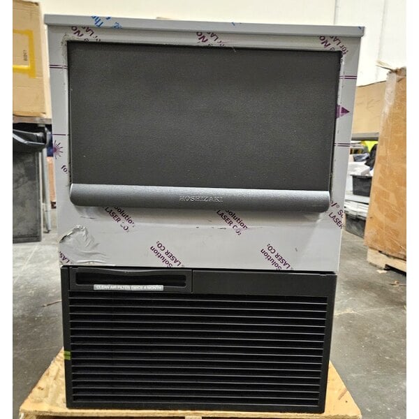 Scratch and Dent Hoshizaki KM-161BWJ 24" Water Cooled Undercounter Crescent Cube Ice Machine with 78 lb. Bin - 115V, 153 lb.