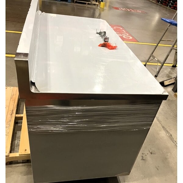 Scratch and Dent Regency 30" x 60" 16 Gauge Type 304 Stainless Steel Enclosed Base Sliding Door Table with Drawers and 6" Backsplash