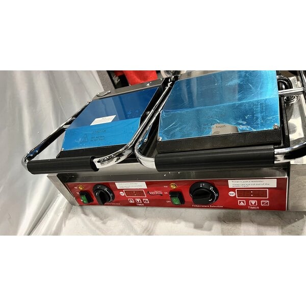 Scratch and Dent Avantco PG400ST Commercial Dual Panini Sandwich Grill with Timer, Smooth Plates, and 19 5/8" x 9 1/8" Cooking Surface - 120V, 3500W