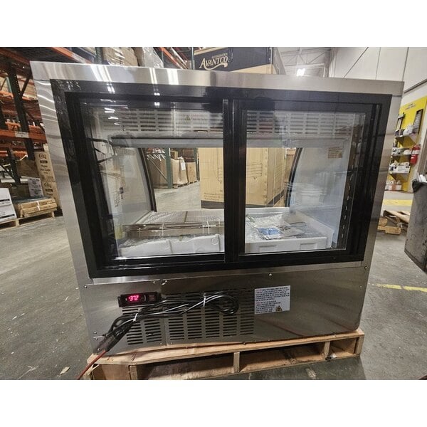 Scratch and Dent Avantco DLC47-HC-S 47" Stainless Steel Curved Glass Refrigerated Deli Case