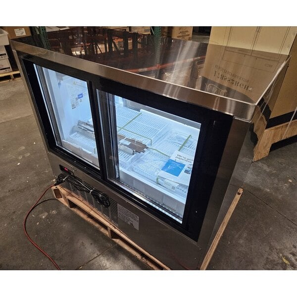 Scratch and Dent Avantco DLC47-HC-S 47" Stainless Steel Curved Glass Refrigerated Deli Case