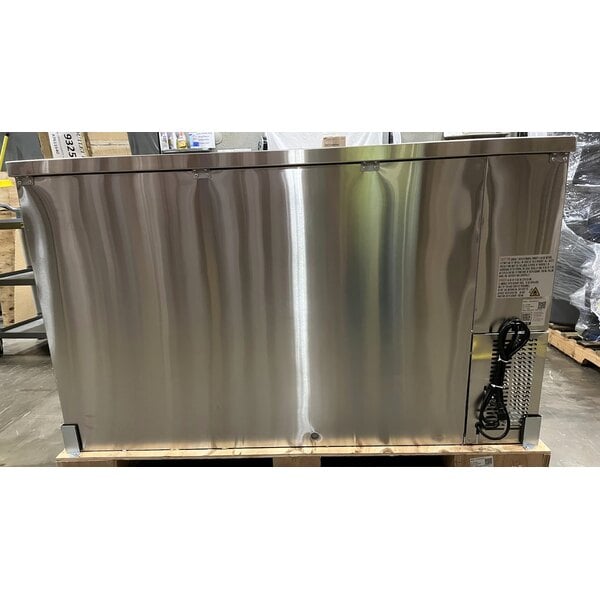 Scratch and Dent Avantco UDD-60-HC-S (2) Four Tap Kegerator Beer Dispenser - Stainless Steel, (2) 1/2 Keg Capacity