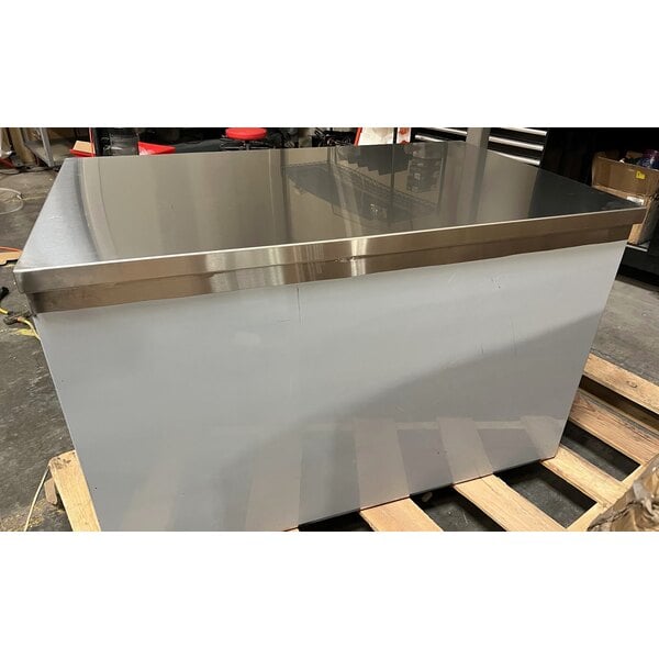 Scratch and Dent Regency 30" x 48" 16 Gauge Type 304 Stainless Steel Enclosed Base Table with Sliding Doors and Adjustable Midshelf