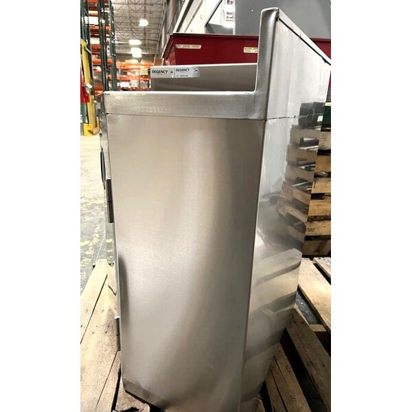 Scratch and Dent Regency Spec Line 24" x 24" 14-Gauge Stainless Steel Corner Work Table with Hinged Door and Lock