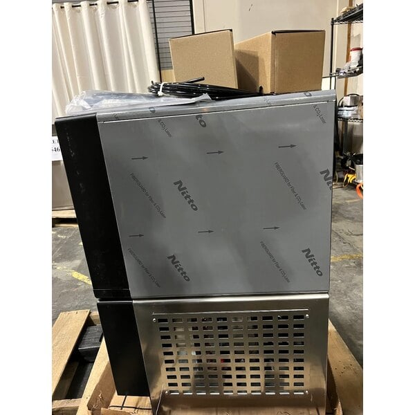 Scratch and Dent Follett 7UC114A-HW-CL-ST-00 Champion 7 Series Air-Cooled Chewblet Undercounter Ice Maker and Hot / Ambient Water Dispenser with 7 lb. Bin and Filter - 115V, 100 lb.