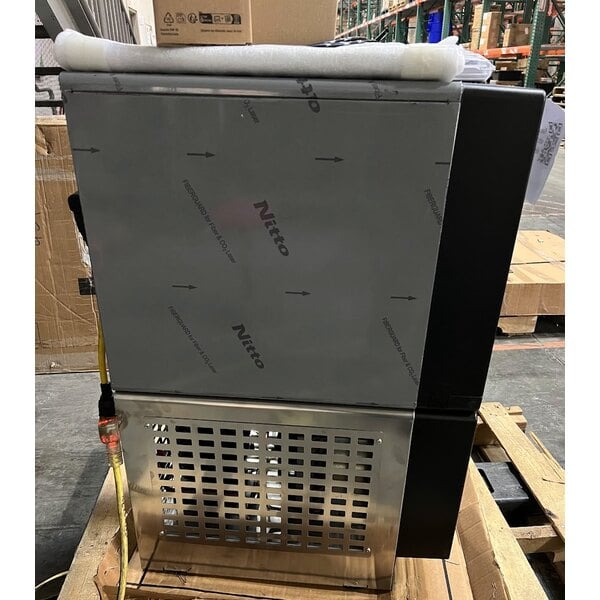 Scratch and Dent Follett 7UC114A-HW-CL-ST-00 Champion 7 Series Air-Cooled Chewblet Undercounter Ice Maker and Hot / Ambient Water Dispenser with 7 lb. Bin and Filter - 115V, 100 lb.