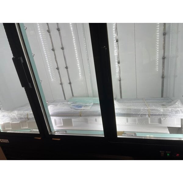Scratch and Dent Avantco GDC-49F-HC 53" Black Swing Glass Door Merchandiser Freezer with LED Lighting