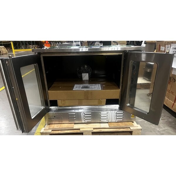Scratch and Dent MainStreet Equipment CG1-N Single Deck Full Size Natural Gas Convection Oven with Legs - 54,000 BTU