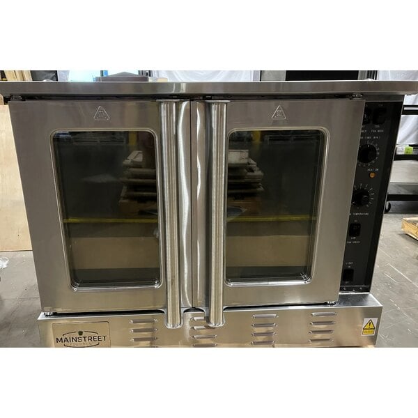 Scratch and Dent MainStreet Equipment CG1-N Single Deck Full Size Natural Gas Convection Oven with Legs - 54,000 BTU