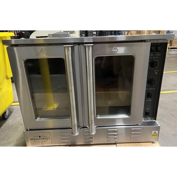 Scratch and Dent MainStreet Equipment CG1-N Single Deck Full Size Natural Gas Convection Oven with Legs - 54,000 BTU