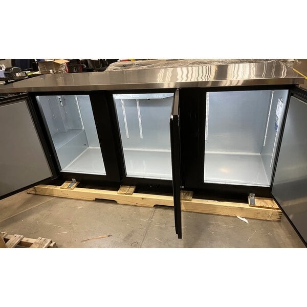 Scratch and Dent True TBB-4-HC 90 3/8" Black Solid Door Back Bar Refrigerator with LED Lighting