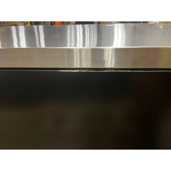 Scratch and Dent True TBB-4-HC 90 3/8" Black Solid Door Back Bar Refrigerator with LED Lighting