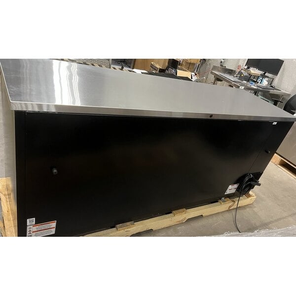 Scratch and Dent True TBB-4-HC 90 3/8" Black Solid Door Back Bar Refrigerator with LED Lighting
