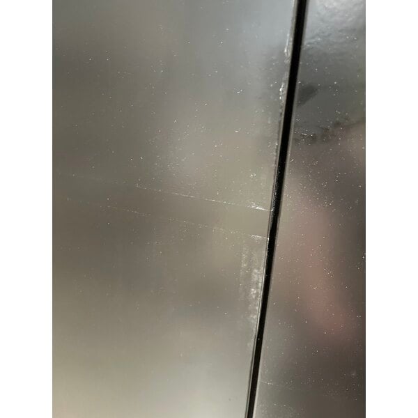 Scratch and Dent True TBB-4-HC 90 3/8" Black Solid Door Back Bar Refrigerator with LED Lighting