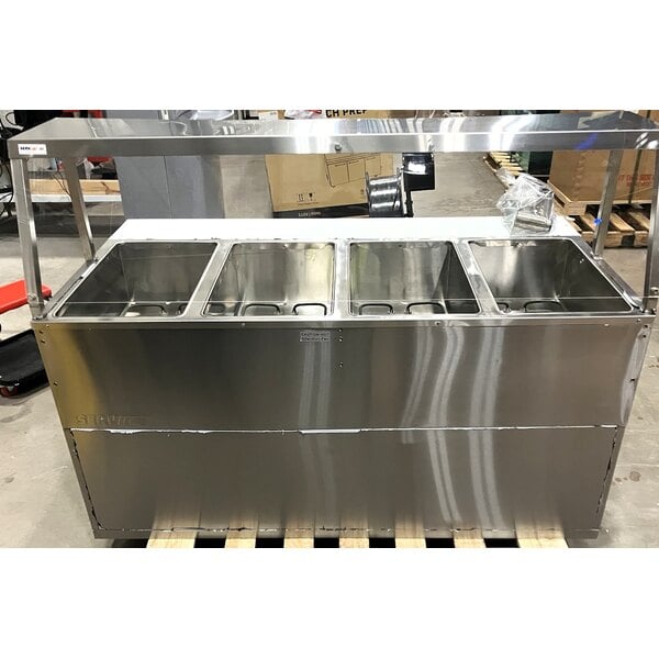Scratch and Dent ServIt Four Pan Open Well Electric Steam Table with Partially Enclosed Base and Angled Sneeze Guard - 120V, 2000W