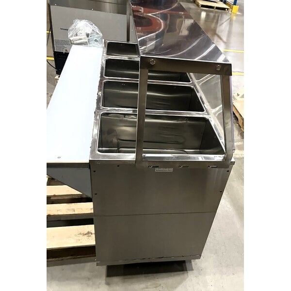 Scratch and Dent ServIt Four Pan Open Well Electric Steam Table with Partially Enclosed Base and Angled Sneeze Guard - 120V, 2000W