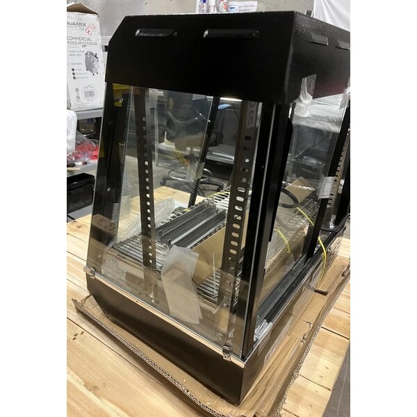 Scratch and Dent Avantco HDC-26 26" Self/Full Service 3 Shelf Countertop Heated Display Case with Sliding Doors - 120V, 1580W