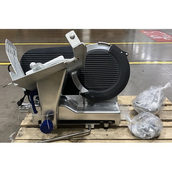 Scratch and Dent Vollrath 40955 13" Heavy Duty Deluxe Meat Slicer with Safe Blade Removal System - 1/2 hp