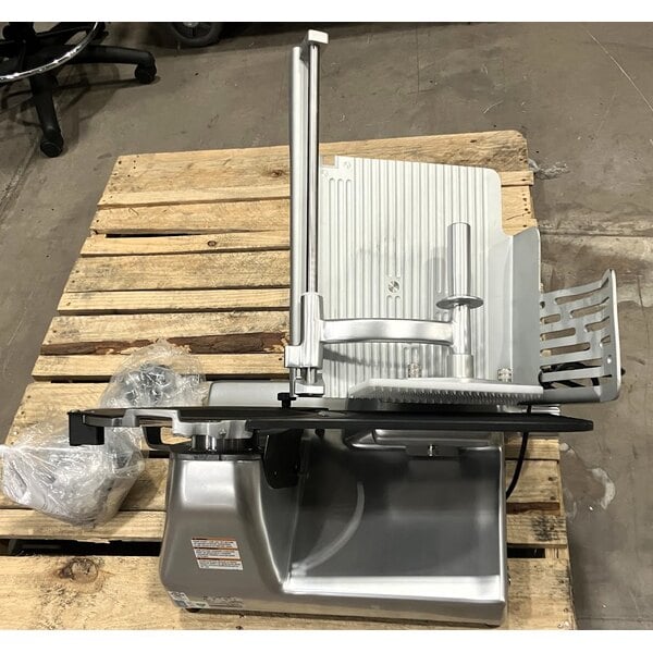 Scratch and Dent Vollrath 40955 13" Heavy Duty Deluxe Meat Slicer with Safe Blade Removal System - 1/2 hp