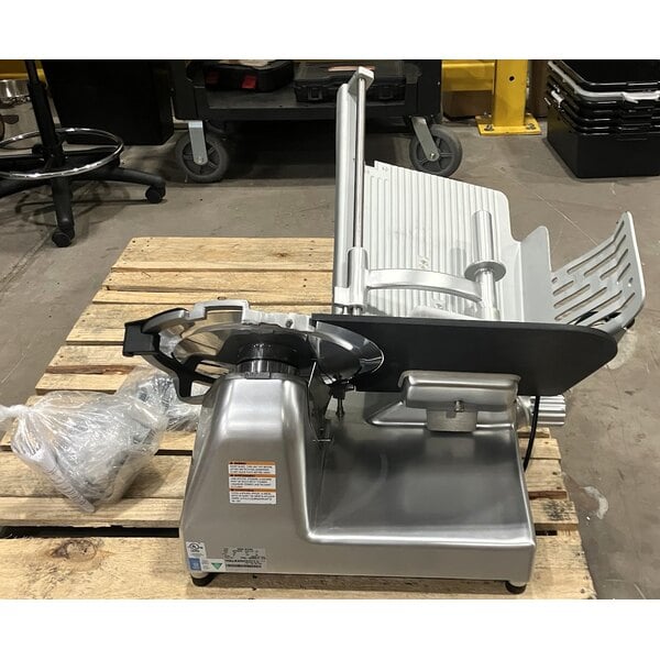 Scratch and Dent Vollrath 40955 13" Heavy Duty Deluxe Meat Slicer with Safe Blade Removal System - 1/2 hp