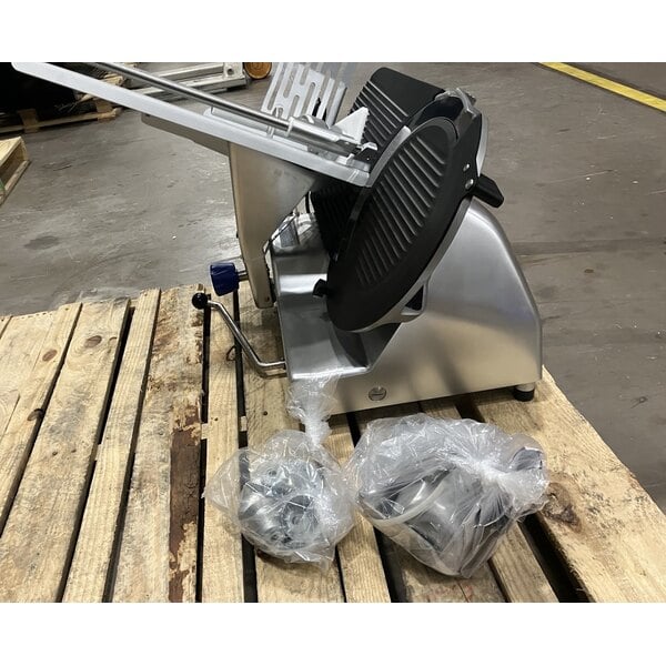 Scratch and Dent Vollrath 40955 13" Heavy Duty Deluxe Meat Slicer with Safe Blade Removal System - 1/2 hp