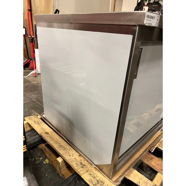 Scratch and Dent Regency 30" x 60" 16 Gauge Type 304 Stainless Steel Enclosed Base Table with Sliding Doors and Adjustable Midshelf