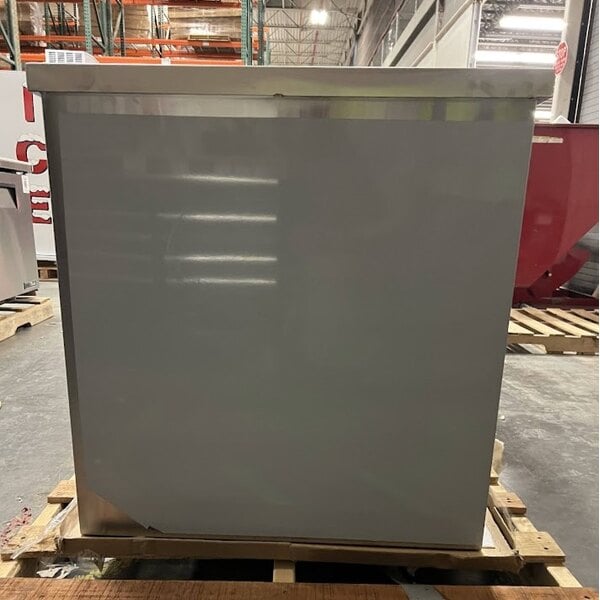 Scratch and Dent Regency 30" x 60" 16 Gauge Type 304 Stainless Steel Enclosed Base Table with Sliding Doors and Adjustable Midshelf