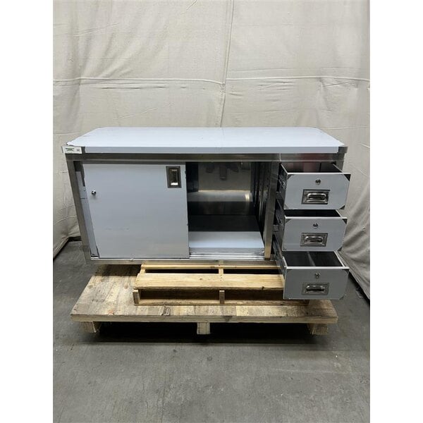 Scratch and Dent Regency 24" x 60" 16 Gauge Type 304 Stainless Steel Enclosed Base Sliding Door Table with Drawers