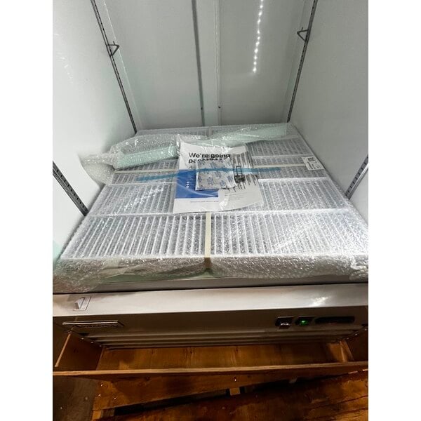 Scratch and Dent Avantco GDC-24F-HC 31" White Swing Glass Door Merchandiser Freezer with LED Lighting