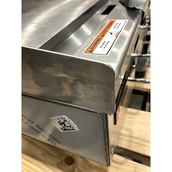 Scratch and Dent Wolf by Vulcan AGM60-LP Liquid Propane 60" Heavy-Duty Gas Countertop Griddle with Manual Controls - 135,000 BTU