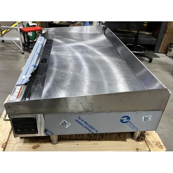 Scratch and Dent Wolf by Vulcan AGM60-LP Liquid Propane 60" Heavy-Duty Gas Countertop Griddle with Manual Controls - 135,000 BTU