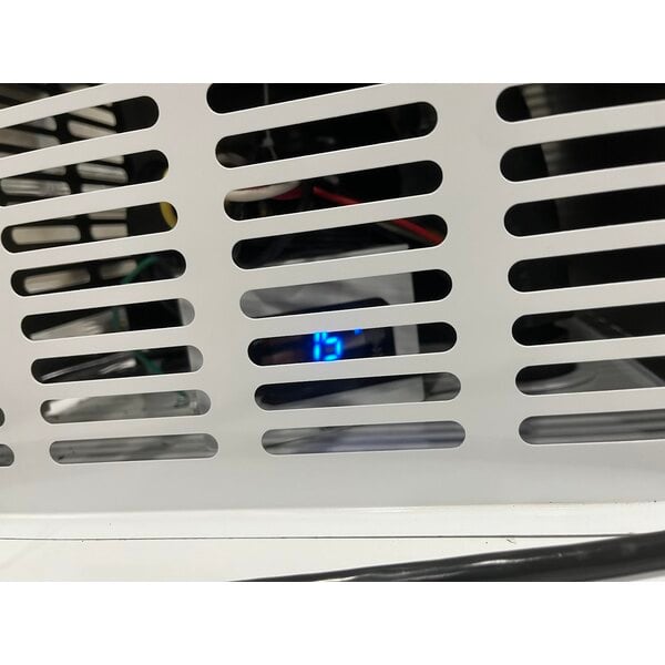 Scratch and Dent Leer 40ASL-R290 51" Outdoor Auto Defrost Ice Merchandiser with Slanted Front and Galvanized Steel Door