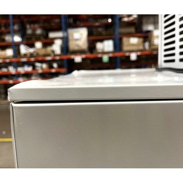 Scratch and Dent Leer 40ASL-R290 51" Outdoor Auto Defrost Ice Merchandiser with Slanted Front and Galvanized Steel Door