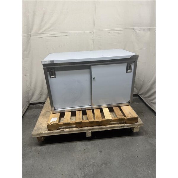 Scratch and Dent Regency 24" x 48" 16 Gauge Type 304 Stainless Steel Enclosed Base Table with Sliding Doors and Adjustable Midshelf